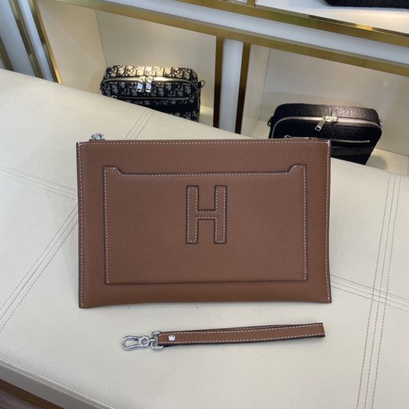 H**mes clutch bags